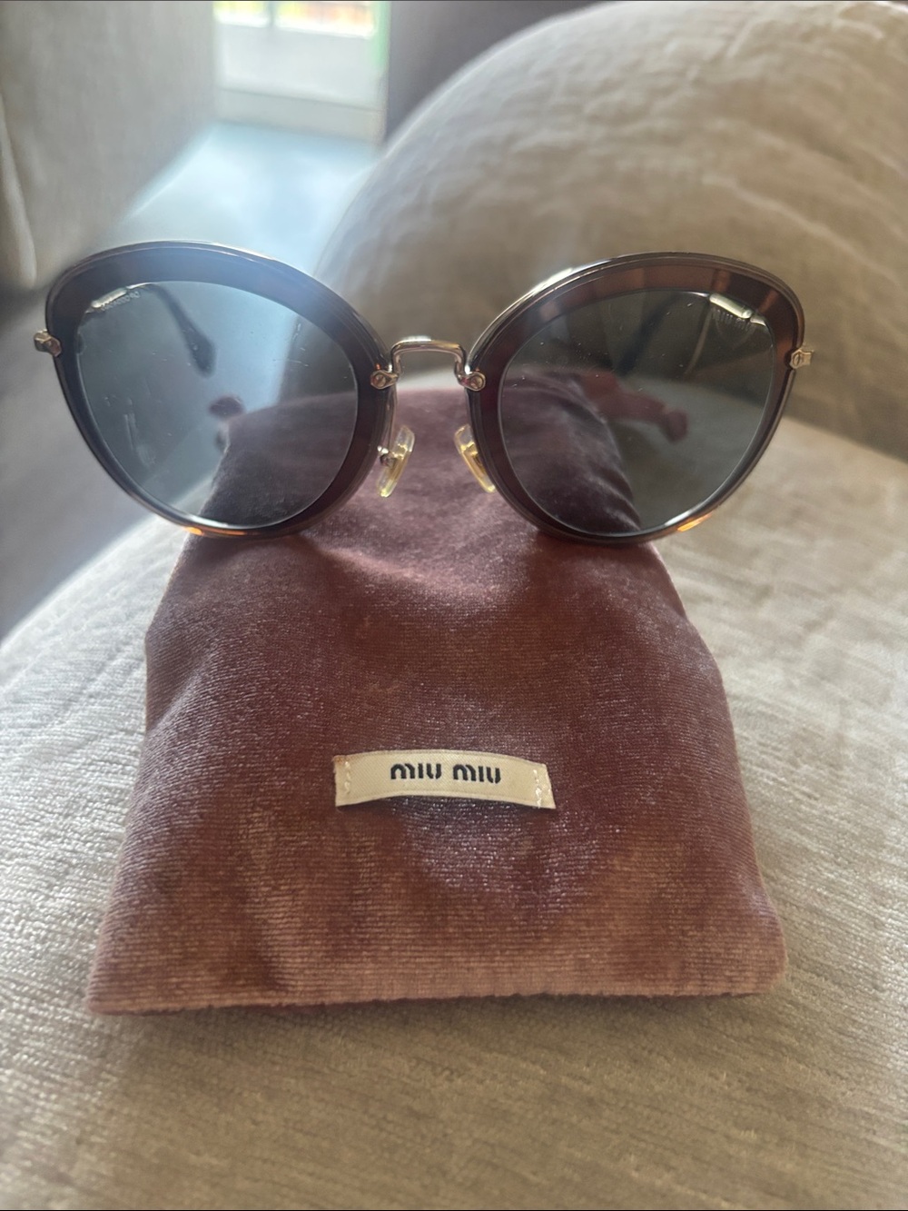 Miu Miu Round Tortoiseshell Frame Sunglasses with Dark Lenses
